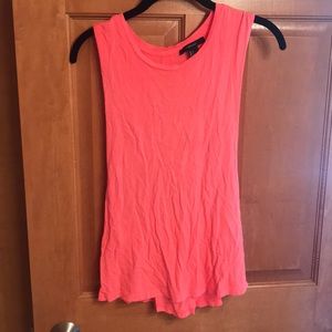 Pink tee with open sides, and a fun open back